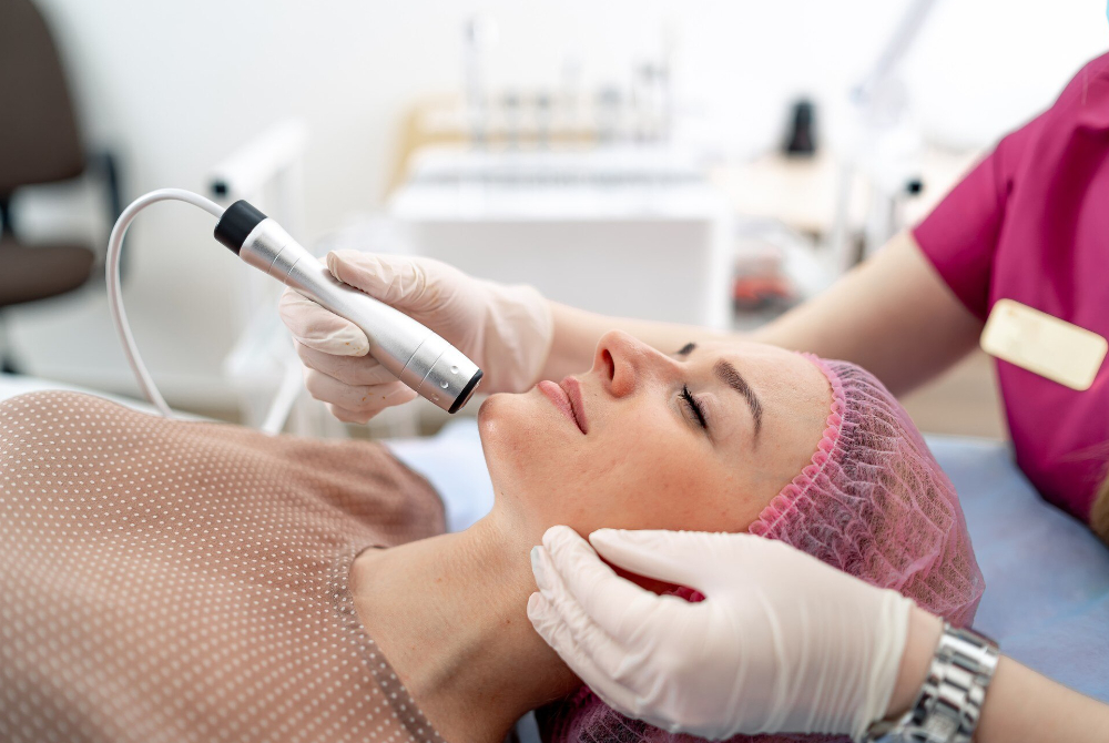 A skincare professional providing a soothing facial rejuvenation treatment at a Scarborough med spa, supporting self-care, confidence, and community wellness.