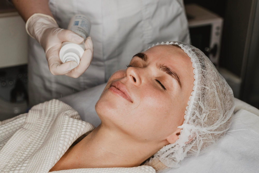 Client receiving a personalized aesthetic treatment at a professional med spa clinic