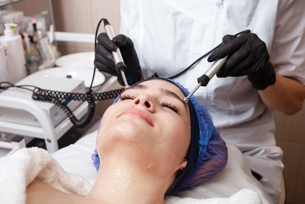 Advanced facial treatment targeting pigmentation using professional skin therapy equipment
